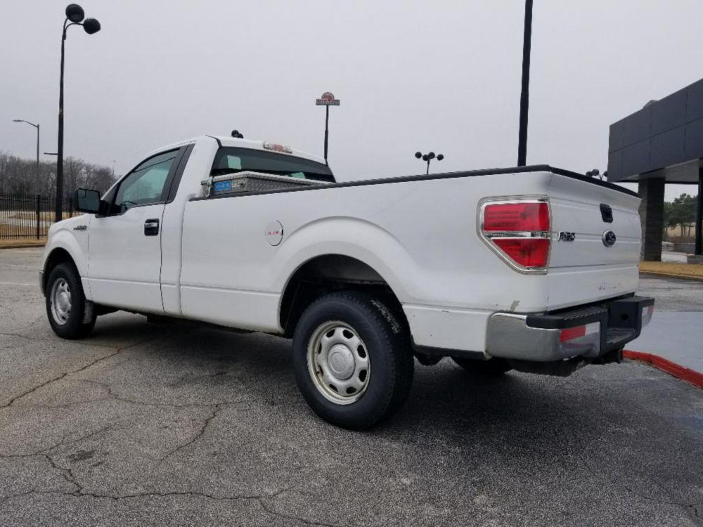 Regular Cab 1/2 ton Gas 7,050 lbs Pickup Truck
