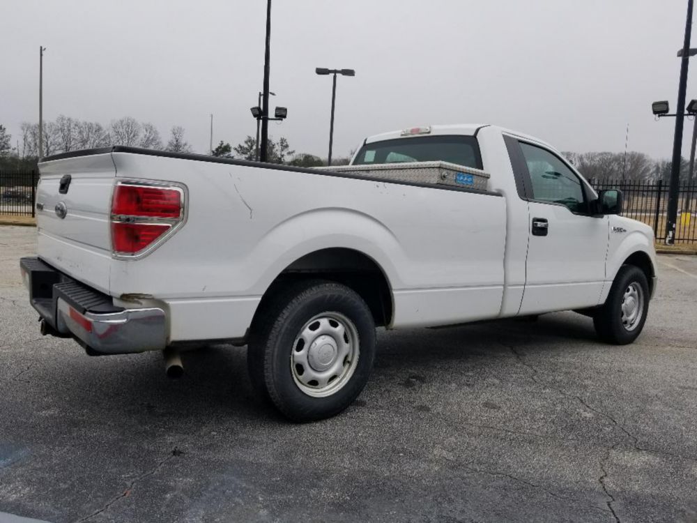 Regular Cab 1/2 ton Gas 7,050 lbs Pickup Truck