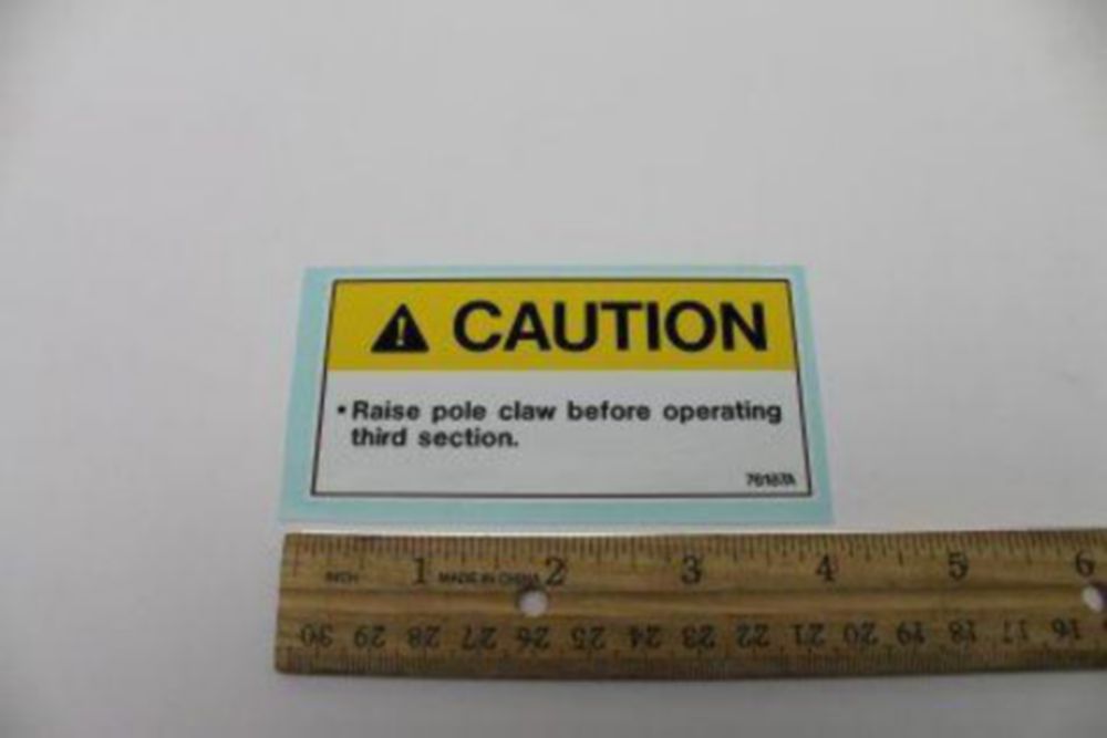 DECAL *CAUTION RAISE POLECLAW