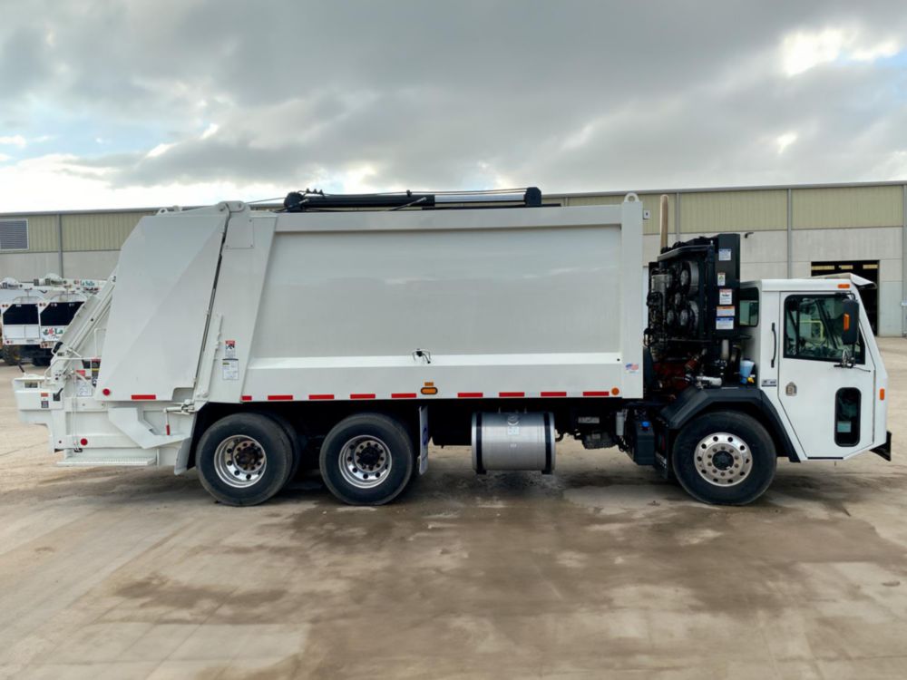 2024 Battle Motors Striker 6x4 Heil DP5000 25 Yd Rear Loader Truck