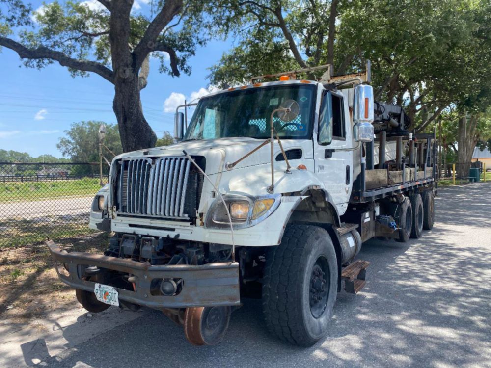 2006 Int'l 7400 "Rail Gear Equipped" Tri-Axle Grapple Truck