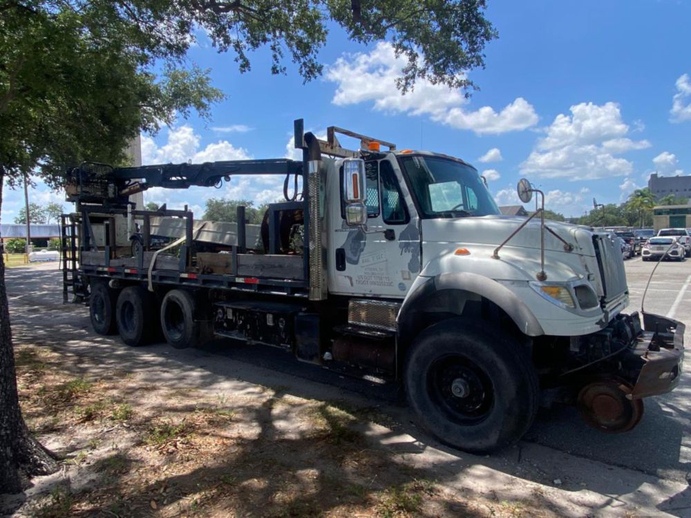 2006 Int'l 7400 "Rail Gear Equipped" Tri-Axle Grapple Truck