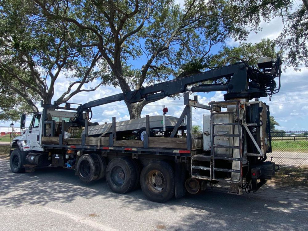 2006 Int'l 7400 "Rail Gear Equipped" Tri-Axle Grapple Truck