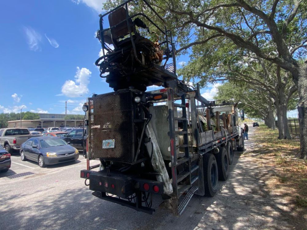 2006 Int'l 7400 "Rail Gear Equipped" Tri-Axle Grapple Truck