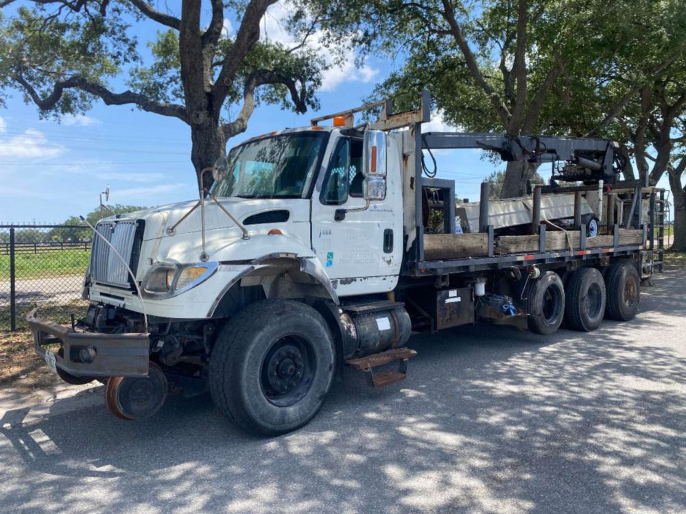 2006 Int'l 7400 "Rail Gear Equipped" Tri-Axle Grapple Truck