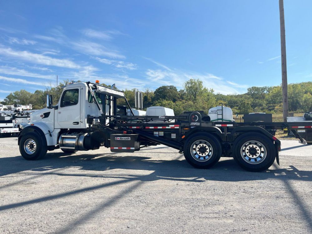 75,000 lbs Cable Tandem Axle Roll-Off Truck