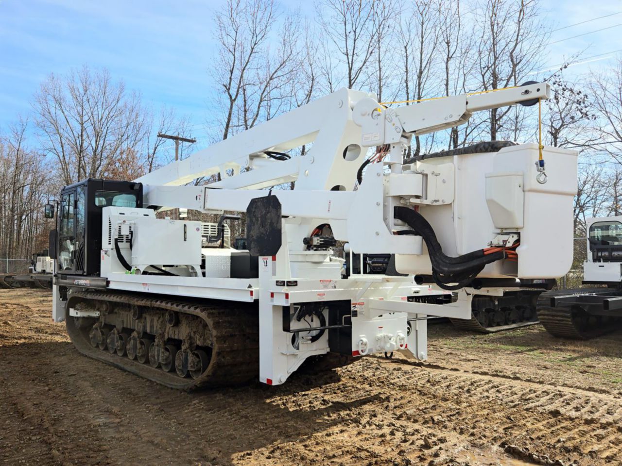 2023 Morooka MST2500VDL 2015 Versalift VST-9000-I Track Bucket Truck