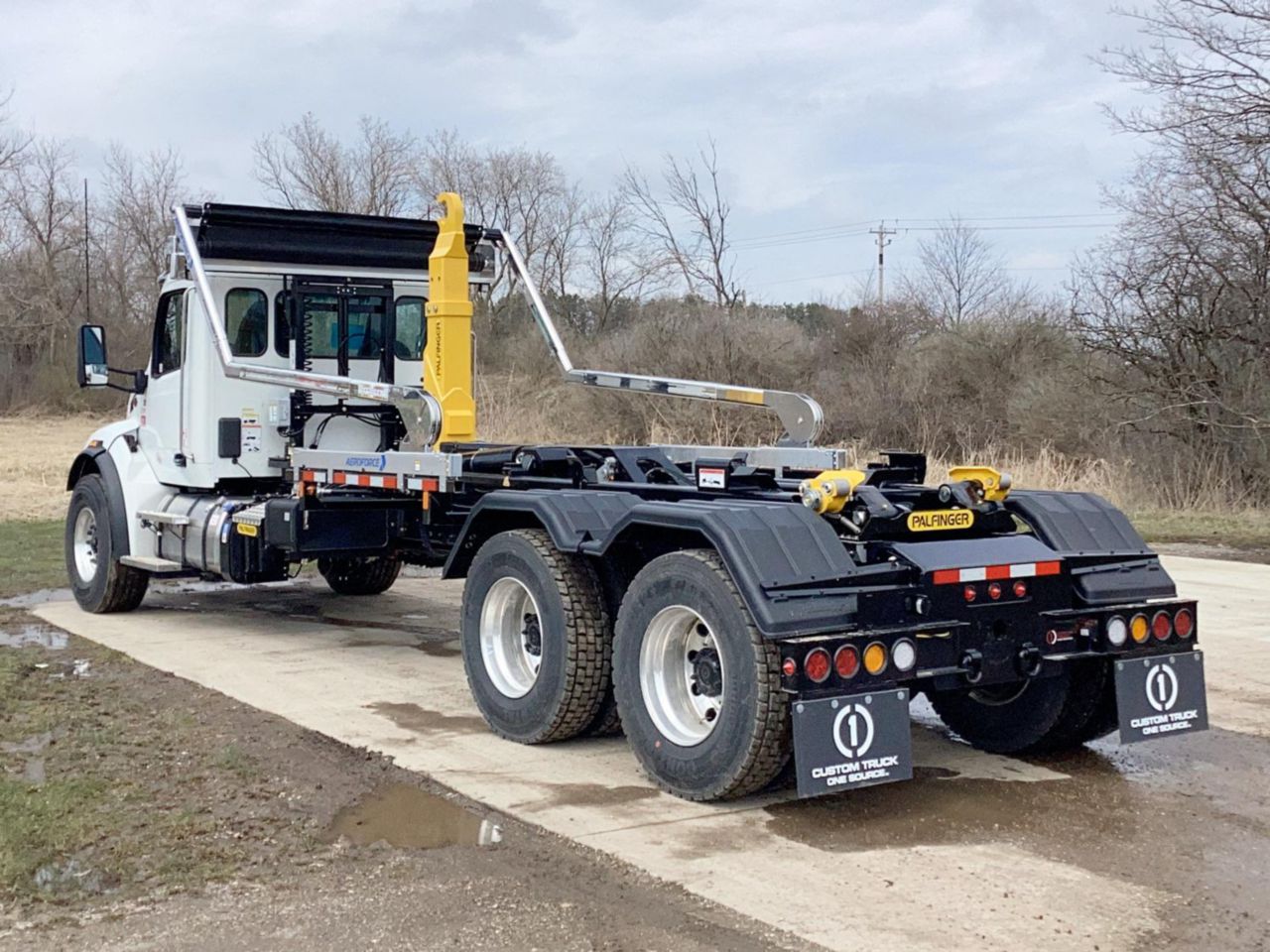 2025 Peterbilt 548 6x4 Palfinger T50 Hook Lift Truck