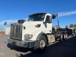 2023 Peterbilt 567 Tri-Axle Roll-Off Truck