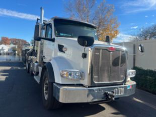 2023 Peterbilt 567 Tri-Axle Roll-Off Truck