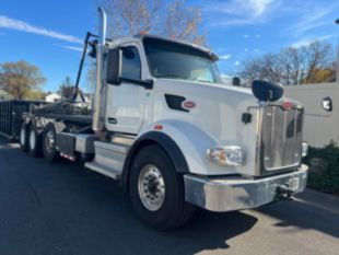 2023 Peterbilt 567 Tri-Axle Roll-Off Truck