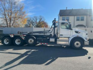 2023 Peterbilt 567 Tri-Axle Roll-Off Truck