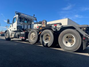 2023 Peterbilt 567 Tri-Axle Roll-Off Truck