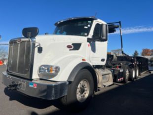 2023 Peterbilt 567 Tri-Axle Roll-Off Truck