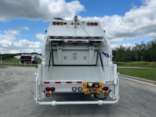 2025 Peterbilt 548 6x4 Loadmaster Excel 25 Yard Rear Loader Truck