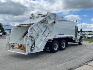 2025 Peterbilt 548 6x4 Loadmaster Excel 25 Yard Rear Loader Truck