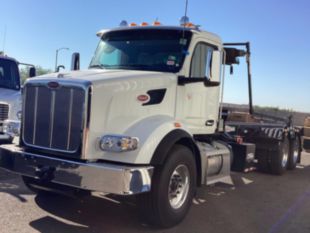 2025 Peterbilt 567 6x4 Load King 60K-CA Roll-Off Truck
