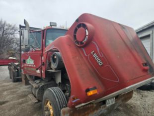 1995 Ford LT9000 Roll-Off Truck