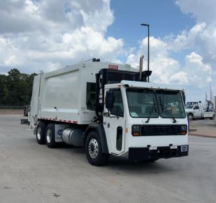 25 cu yd 350 hp Tandem Axle Rear Loader