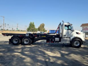 2025 Peterbilt 567 6x4 Spartan SRO60SC Roll-Off Truck