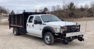 Medium-Duty Liftgate Hi-Rail Flatbed Truck